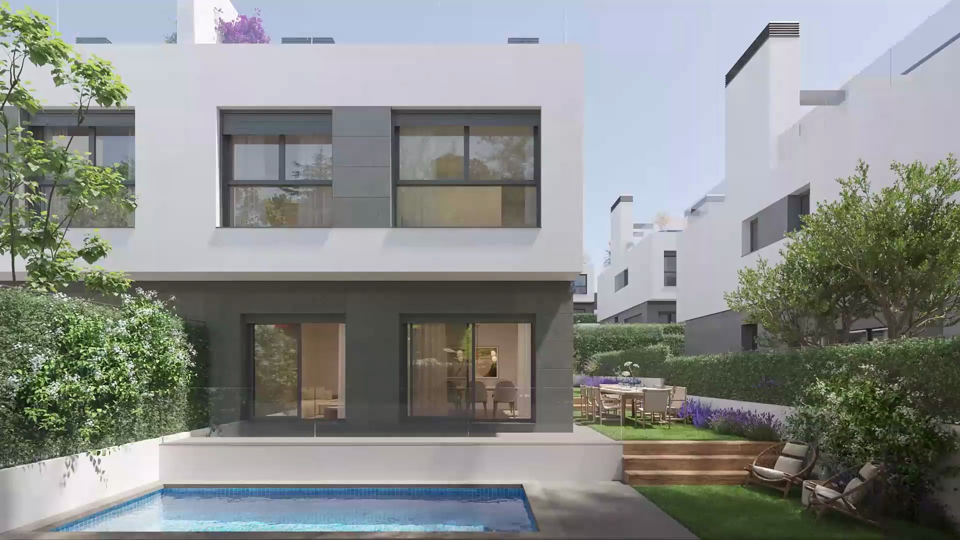 Fachada y piscina de una unifamiliar de Las Rozas